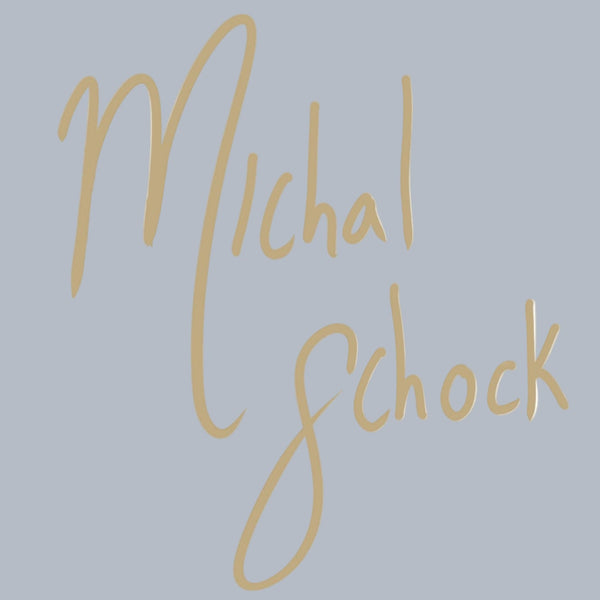 Gold cursive text 'Michal Schock' on a white background